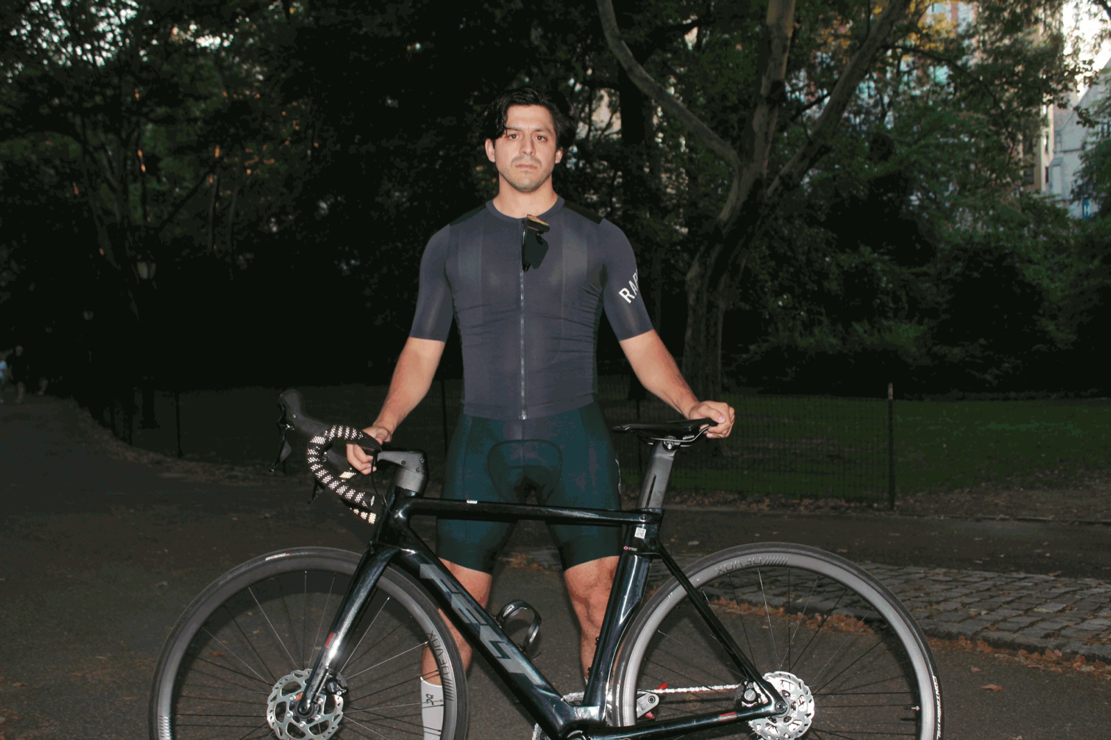 Nick with his road bike in Central Park at dusk